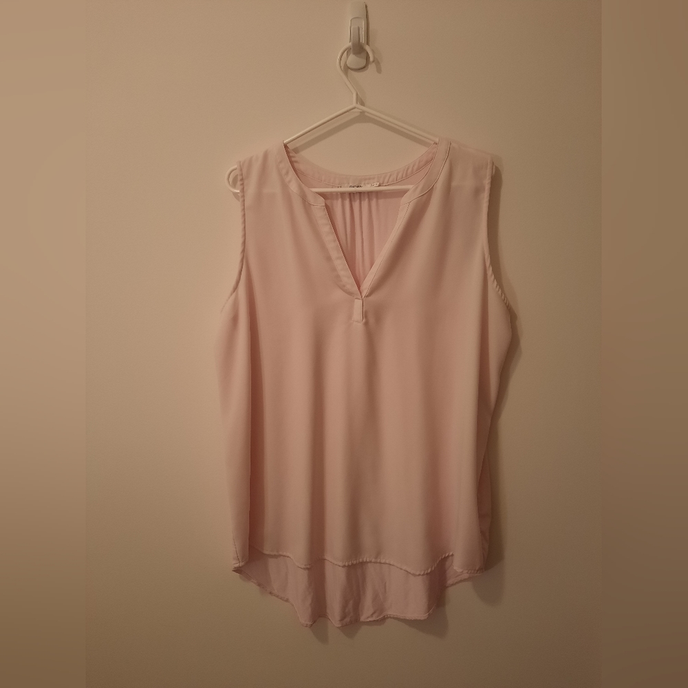 Ricki's light pink sleeveless blouse